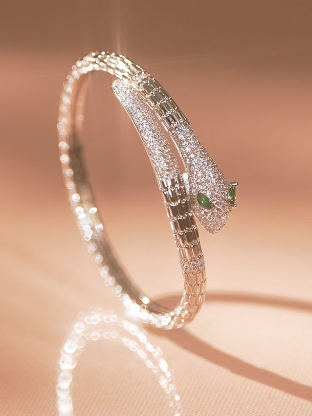 Rubans Rhodium-Plated Cubic Zirconia Snake-Inspired Openable Bracelet with Emerald Accents