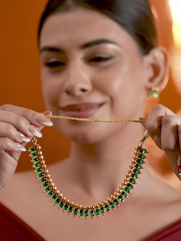 Emerald Studded Gold Beads Necklace Set