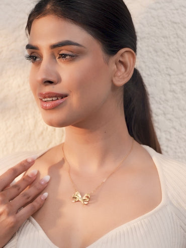Gold Toned Bow Motif Pendant