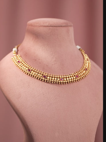 Ruby Studded Golden Necklace Set