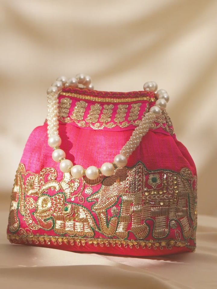 Rubans Pink Coloured Potli Bag With Golden Embroidery Design