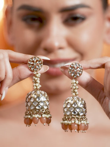 Rubans Handcrafted 22K Gold Plated Kundan Studded Dome Jhumka Earrings with Peach & Pearl Beads