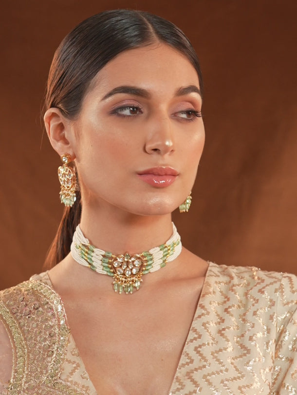 Rubans Gold Plated Kundan Choker Set With White And Mint Green Beads