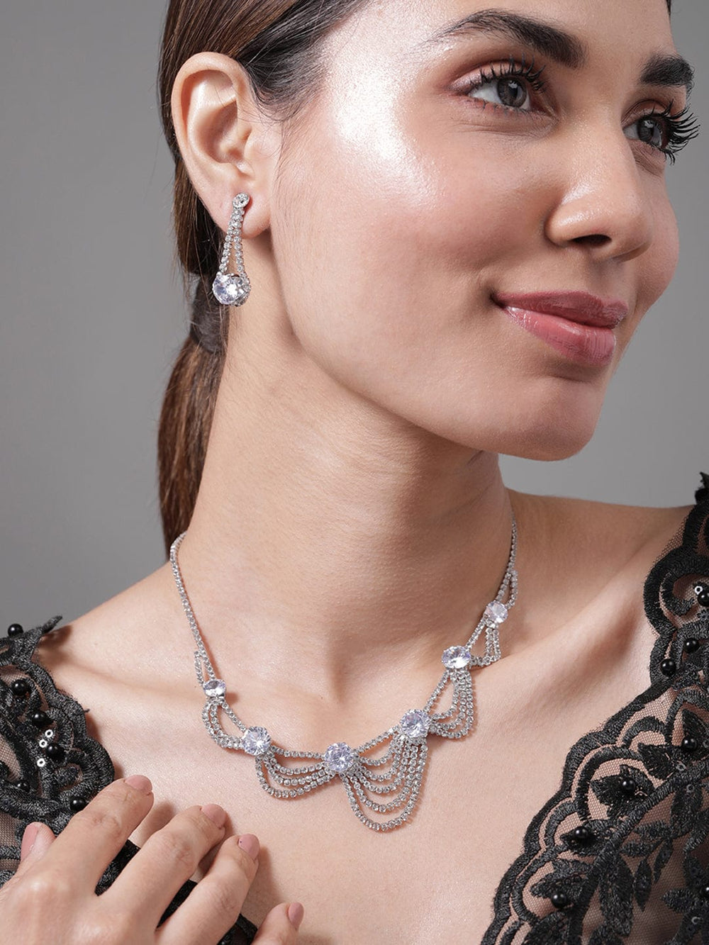 Rhodium Plated AD & Cubic Zirconia Studded Layered Statement Necklace Set Necklace and Earrings