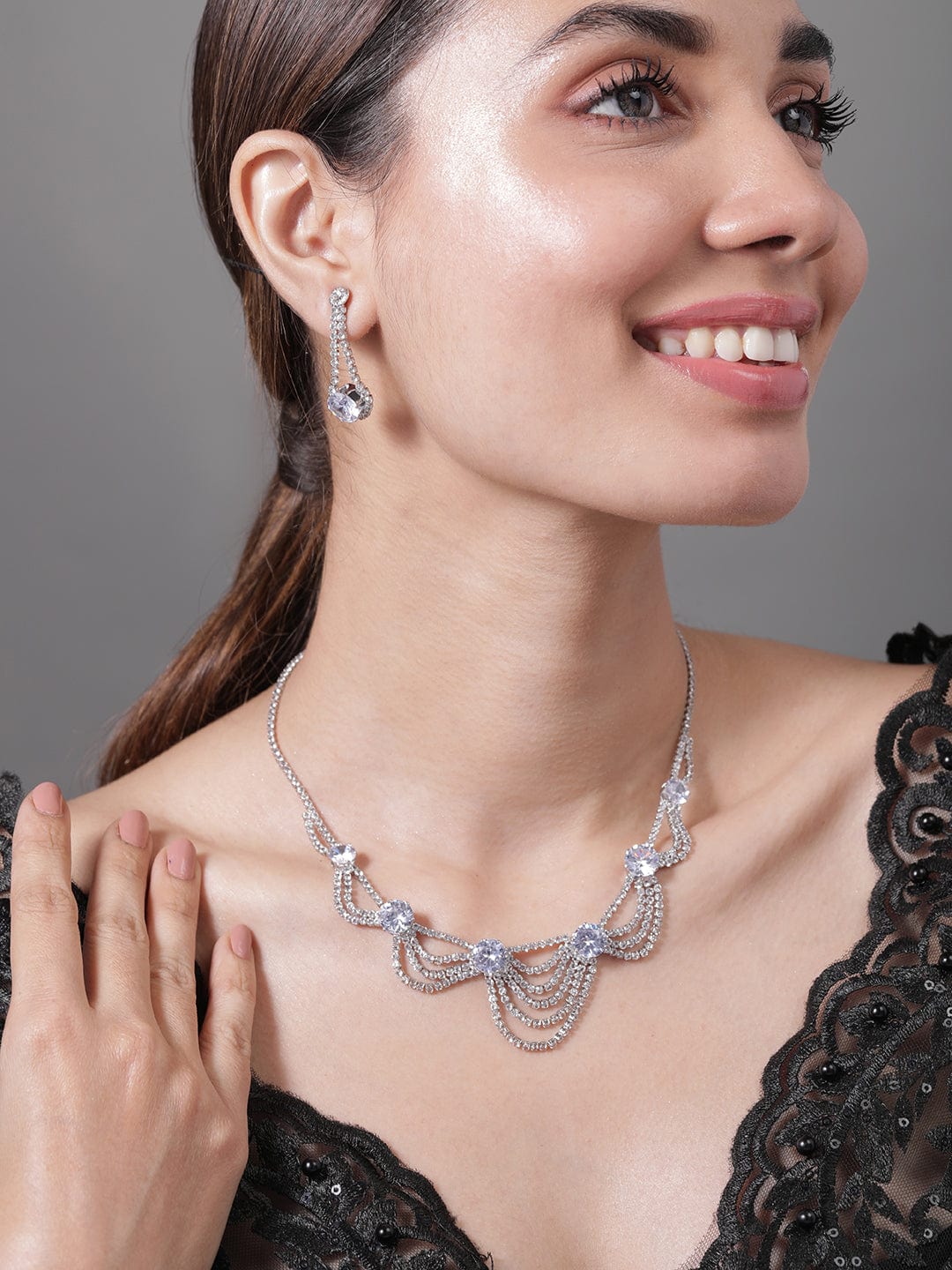 Rhodium Plated AD & Cubic Zirconia Studded Layered Statement Necklace Set Necklace and Earrings