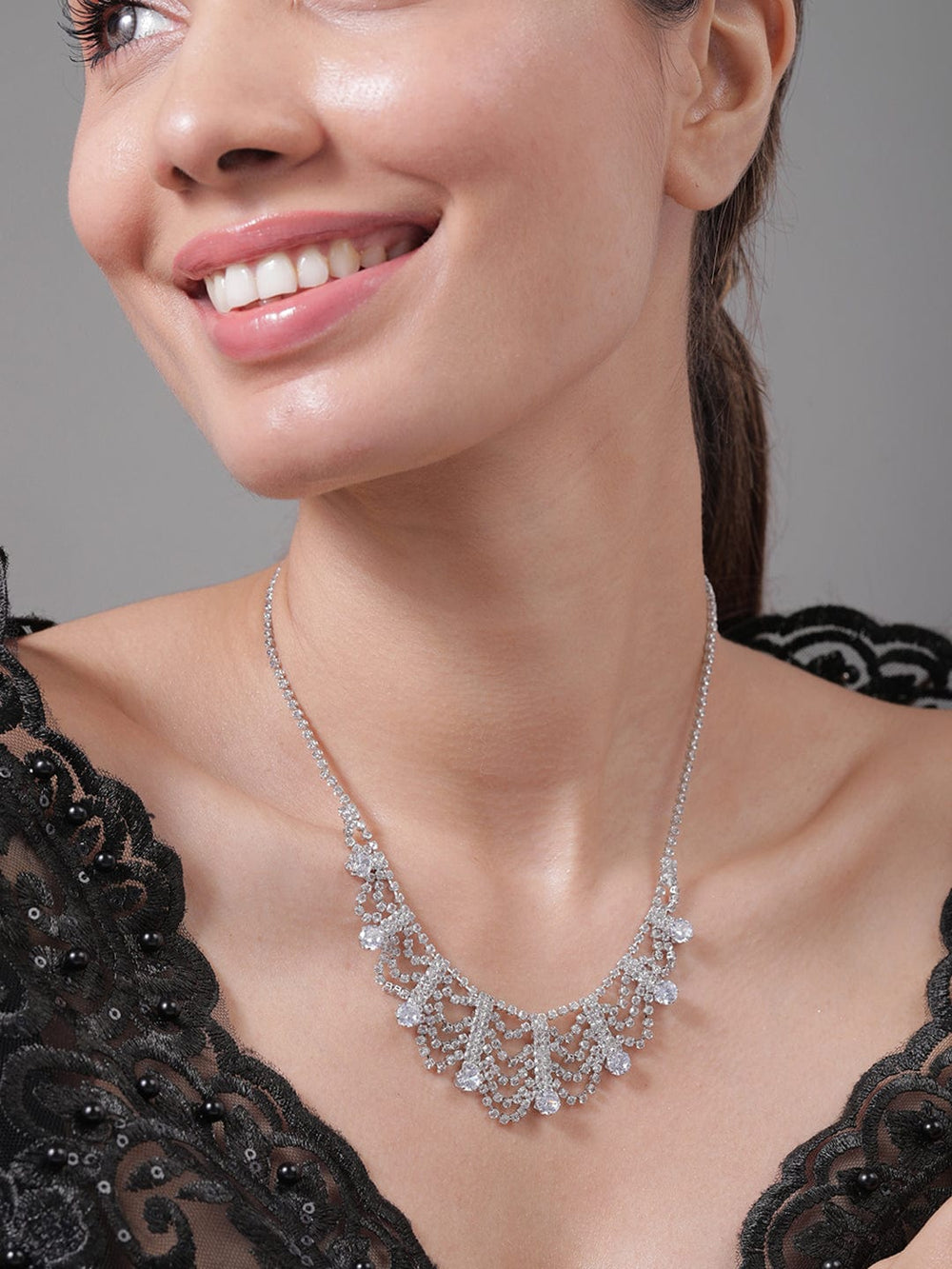 Rhodium Plated AD & Cubic Zirconia Studded Luxurious Draped Statement Necklace Necklace