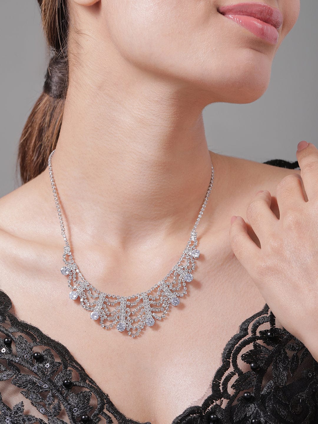 Rhodium Plated AD & Cubic Zirconia Studded Luxurious Draped Statement Necklace Necklace