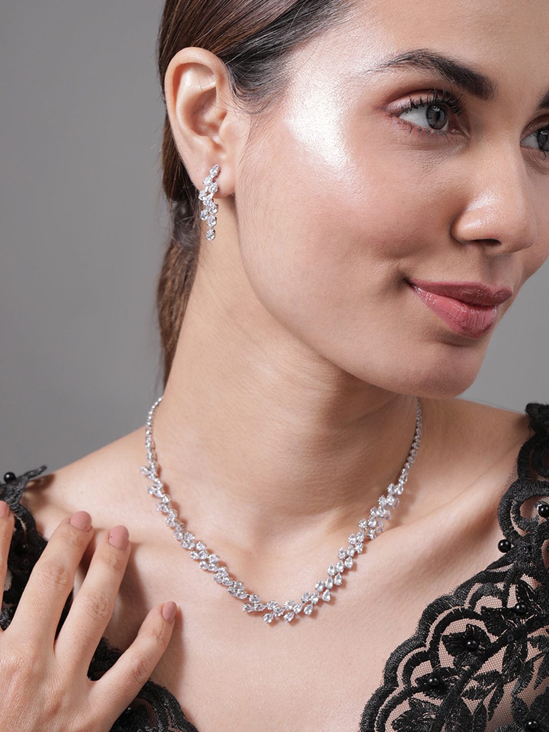 Rhodium Plated AD & Cubic Zirconia Studded Luxurious Floral Motif Necklace Set Necklace and Earrings