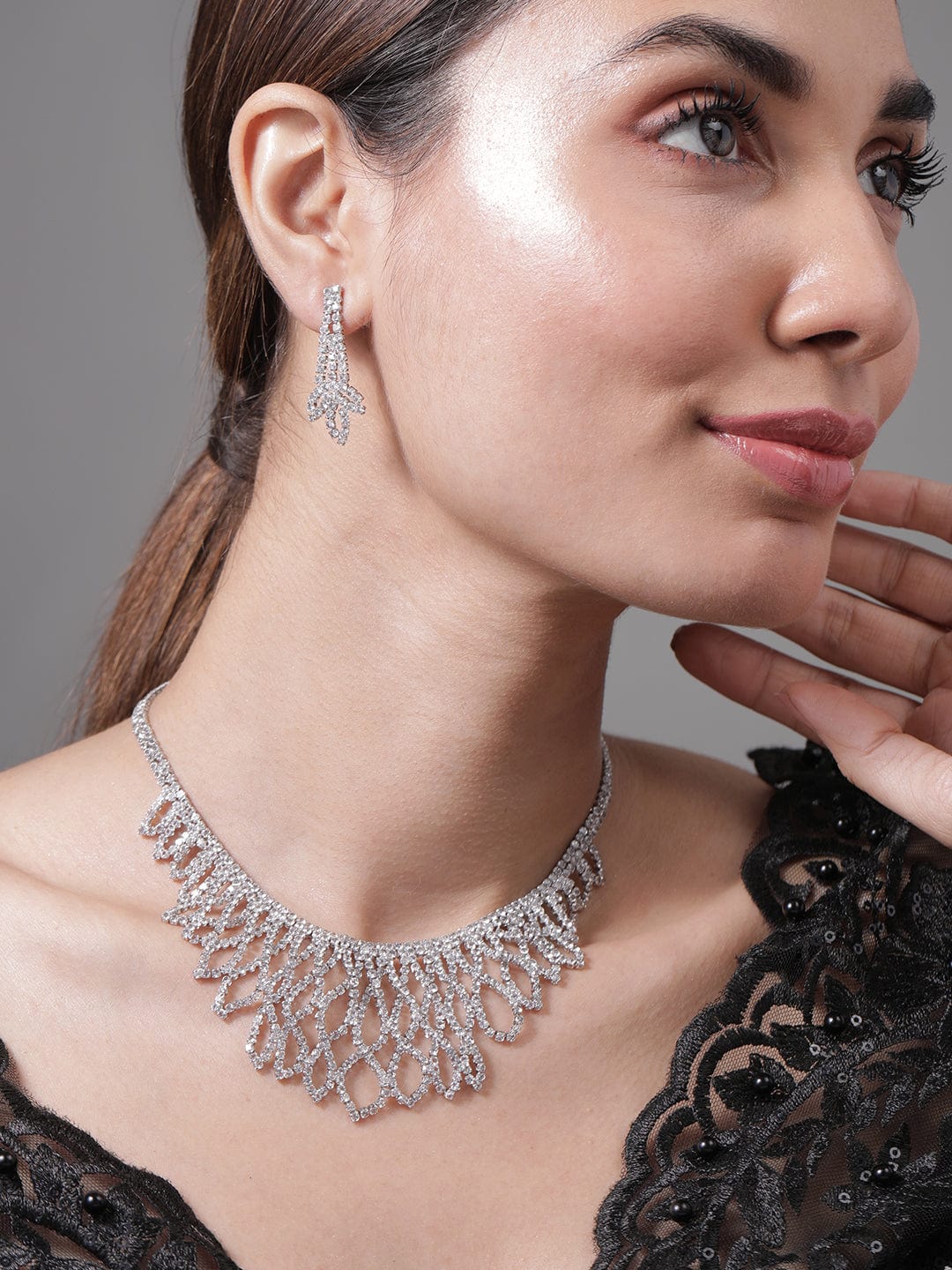 Rhodium Plated AD & Cubic Zirconia Studded Luxurious Leaf Motif Necklace Set Necklace and Earrings