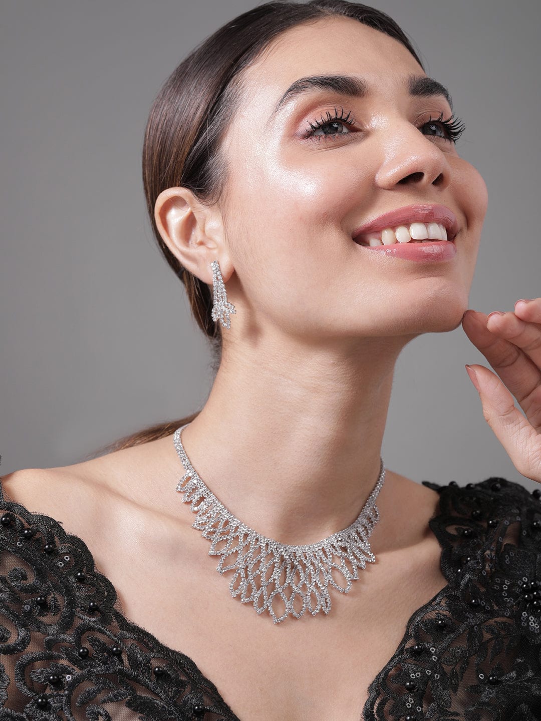 Rhodium Plated AD & Cubic Zirconia Studded Luxurious Leaf Motif Necklace Set Necklace and Earrings