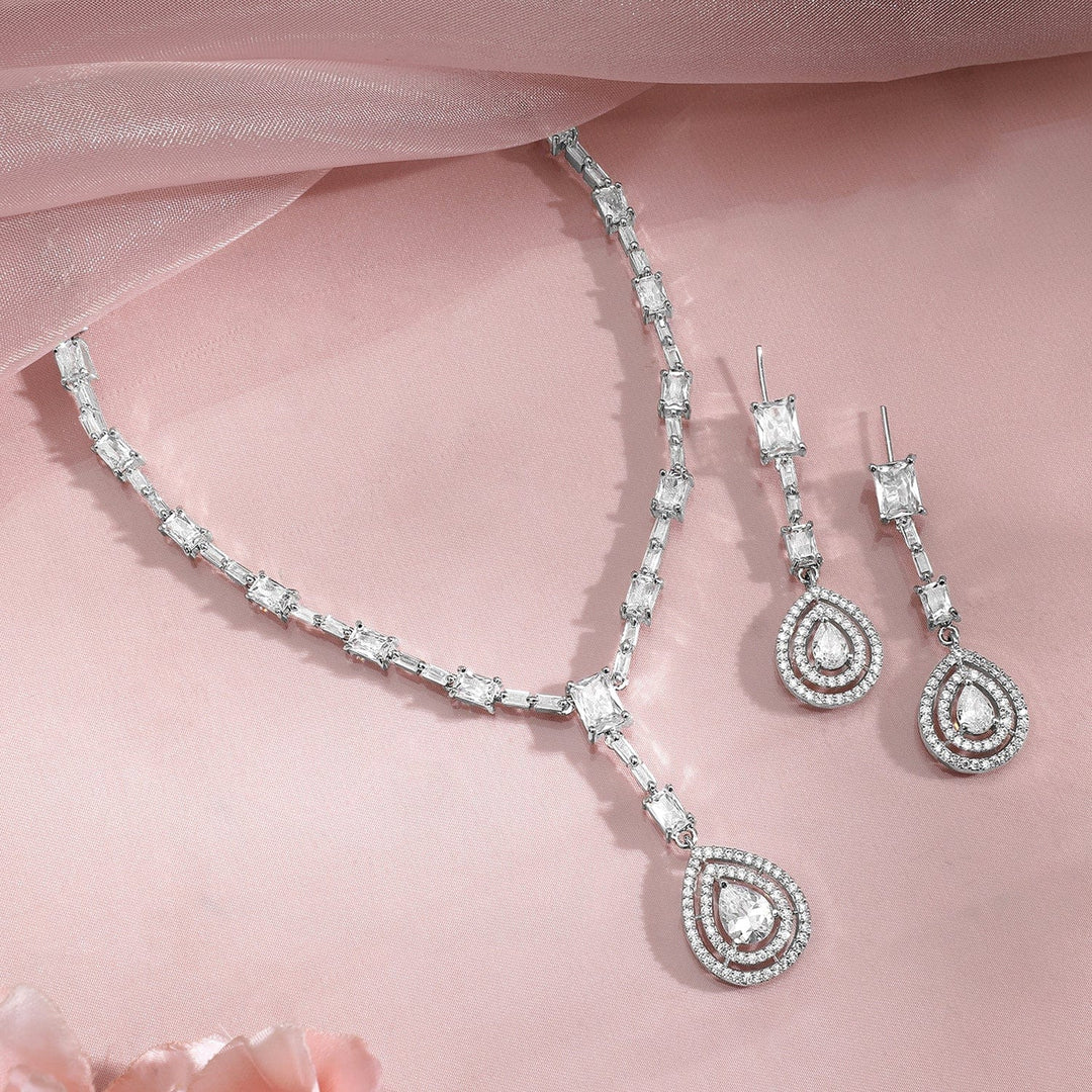 Rhodium Plated AD & Cubic Zirconia Studded Necklace Set with Teardrop Pendants Pendant and Earrings