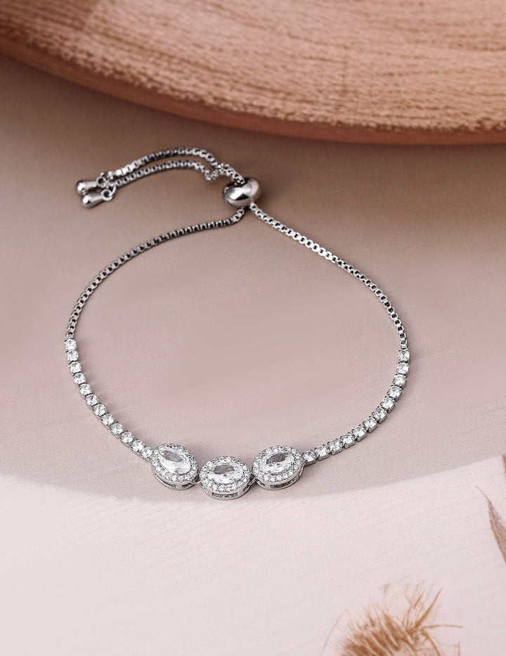 Rhodium Plated AD & Cubic Zirconia Studded Triple Oval Charm Bracelet Bracelet