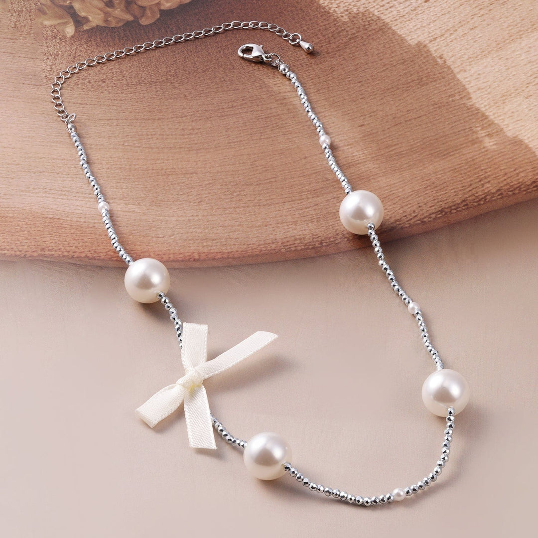 Rhodium-Plated Chain Necklace with Faux Pearls and Fabric Ribbon Bow Accent Necklace