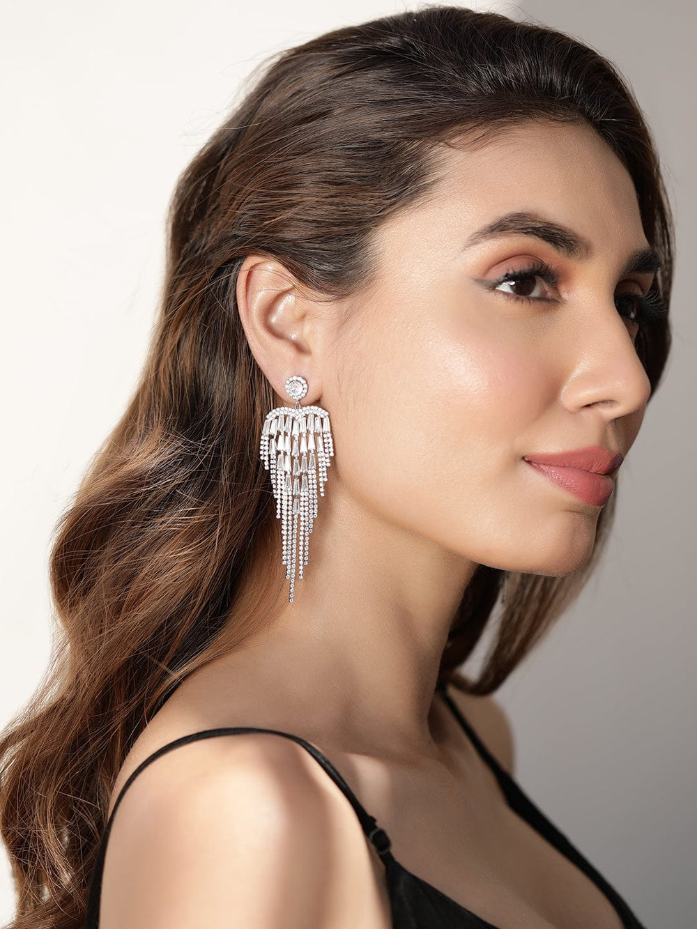 Rhodium plated crystal zirconia studded tassels party wear earrings Earrings