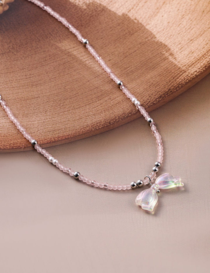 Rhodium Plated Pink Beaded Necklace with Iridescent Butterfly Bow Pendant Necklace and Chains