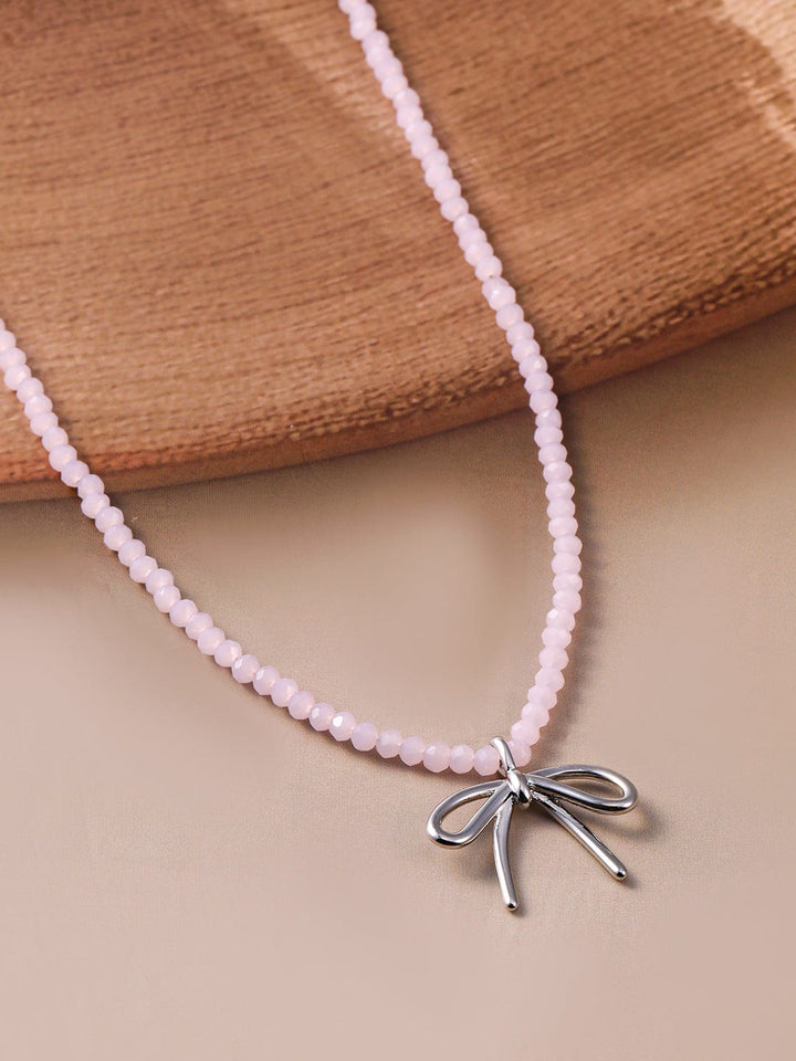 Rhodium Plated Soft Pink Beaded Necklace with Silver Bow Pendant Necklace and Chains