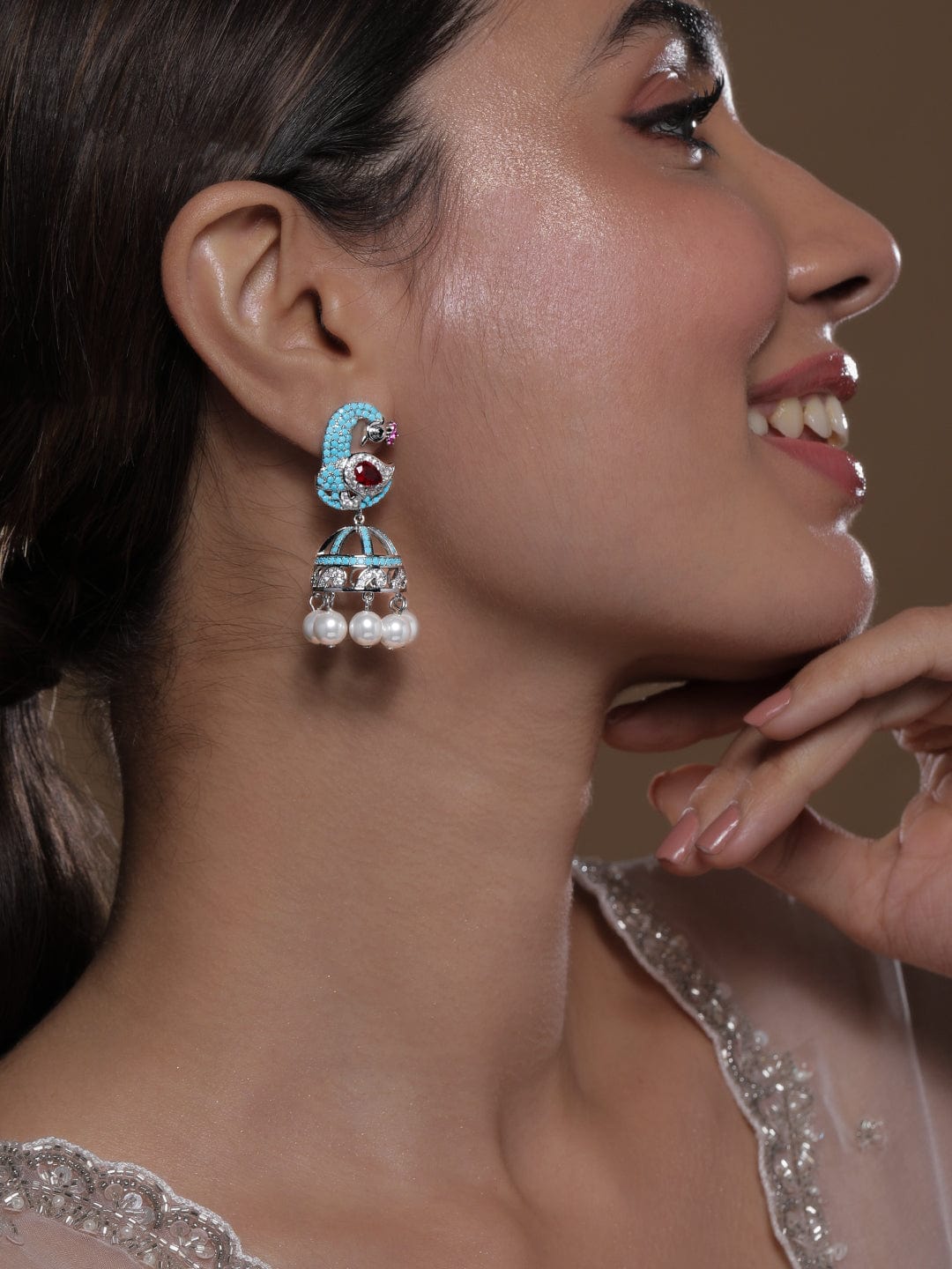 Rhodium-Plated Turquoise Blue & Ruby AD & Zirconia Studded Peacock Design Jhumka Earrings Jhumkas