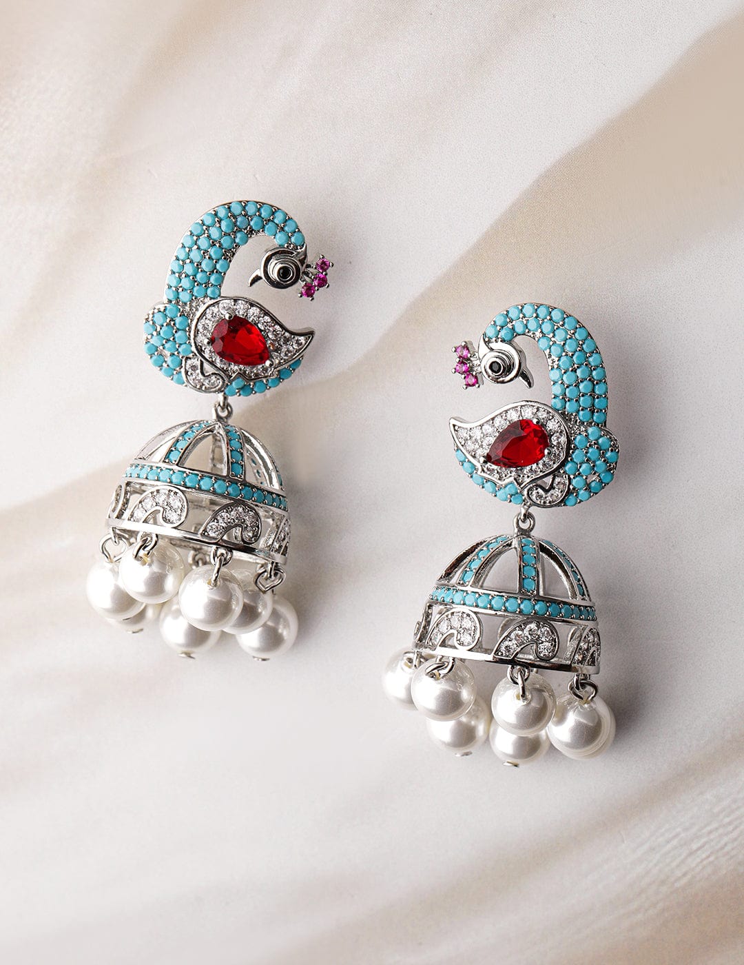 Rhodium-Plated Turquoise Blue & Ruby AD & Zirconia Studded Peacock Design Jhumka Earrings Jhumkas