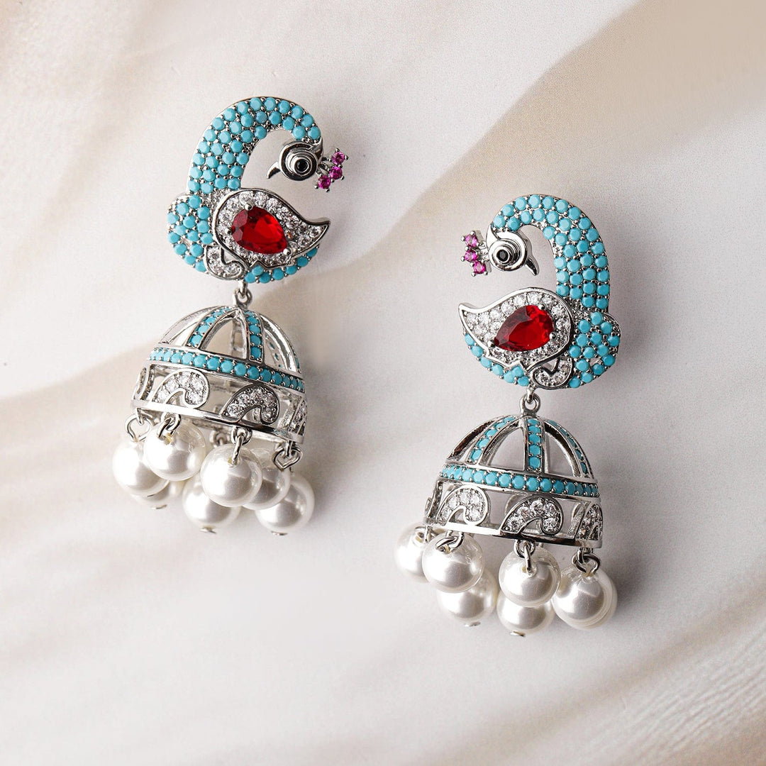 Rhodium-Plated Turquoise Blue & Ruby AD & Zirconia Studded Peacock Design Jhumka Earrings Jhumkas