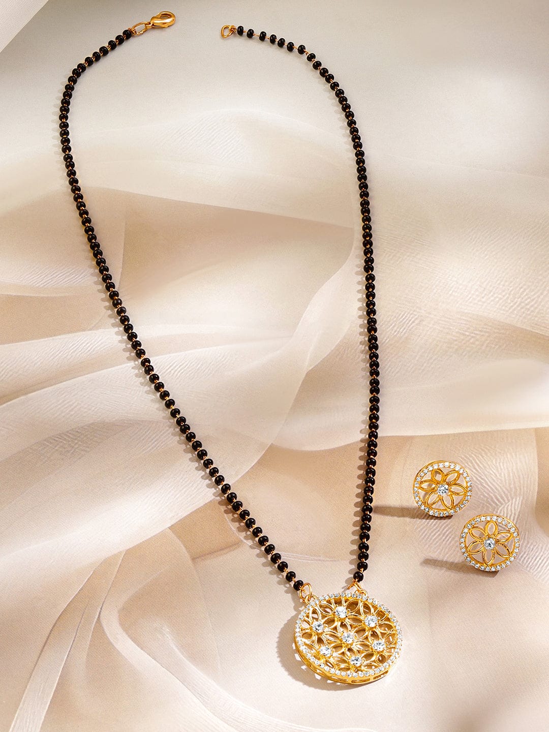 Rubans 18K Gold-Plated White Cubic Zirconia Studded Floral Pendant Mangalsutra Set with Black Beaded Chain & Earrings Mangalsutra