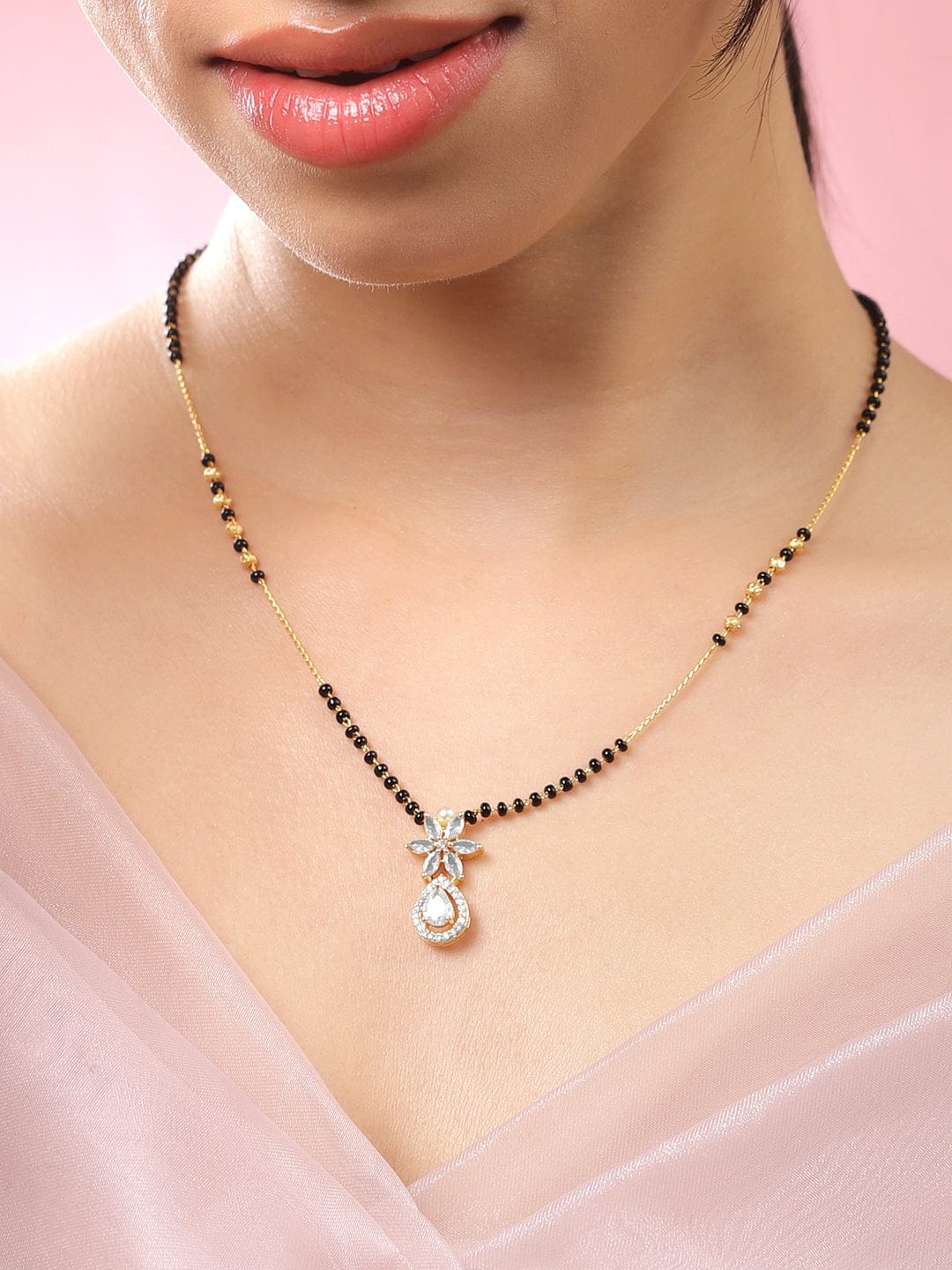 Rubans 18K Gold-Plated White Cubic Zirconia Studded Floral & Teardrop Pendant Mangalsutra with Black & Gold Beaded Chain Mangalsutra
