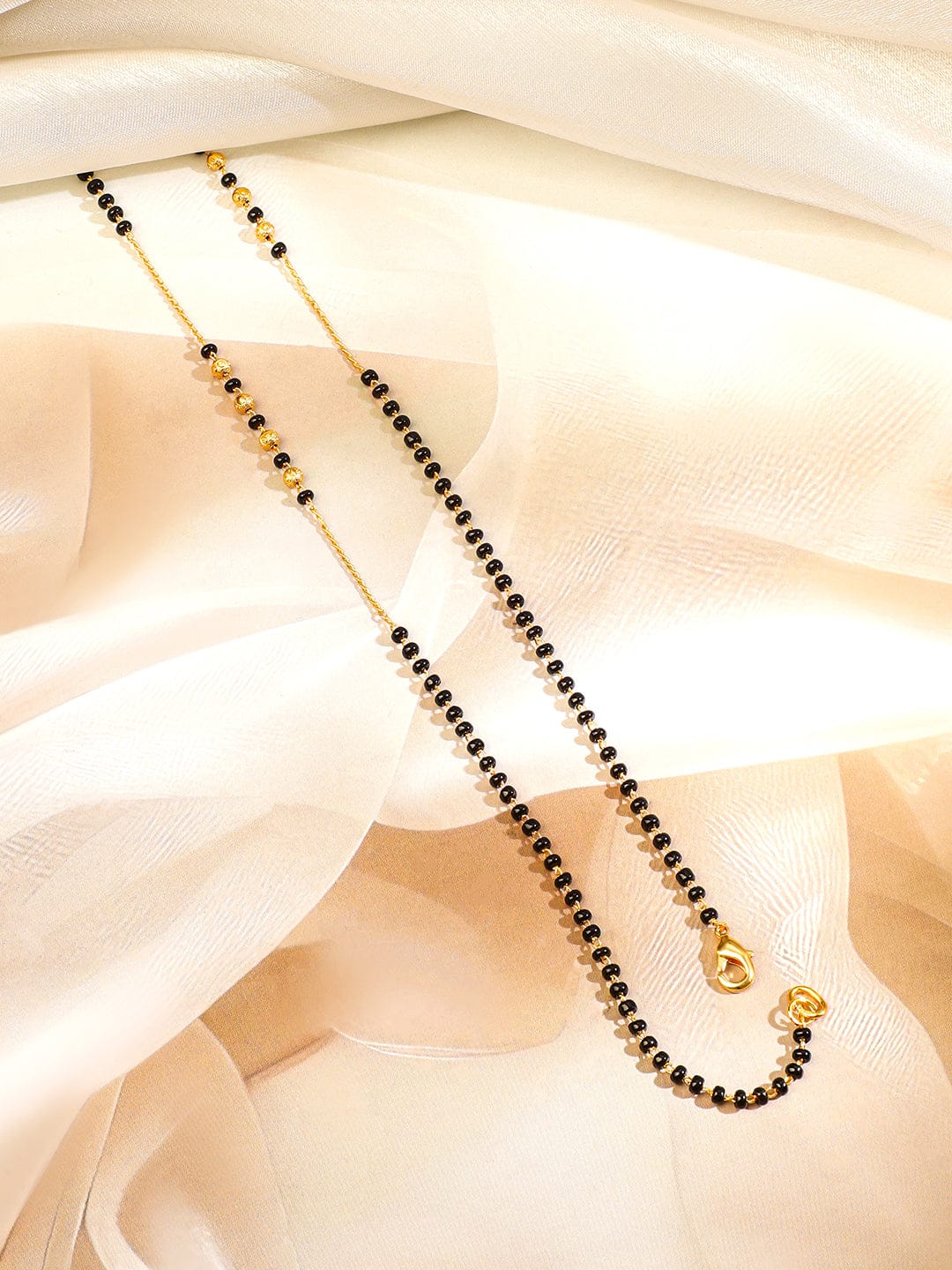 Rubans 18K Gold-Plated White Cubic Zirconia Studded Floral & Teardrop Pendant Mangalsutra with Black & Gold Beaded Chain Mangalsutra