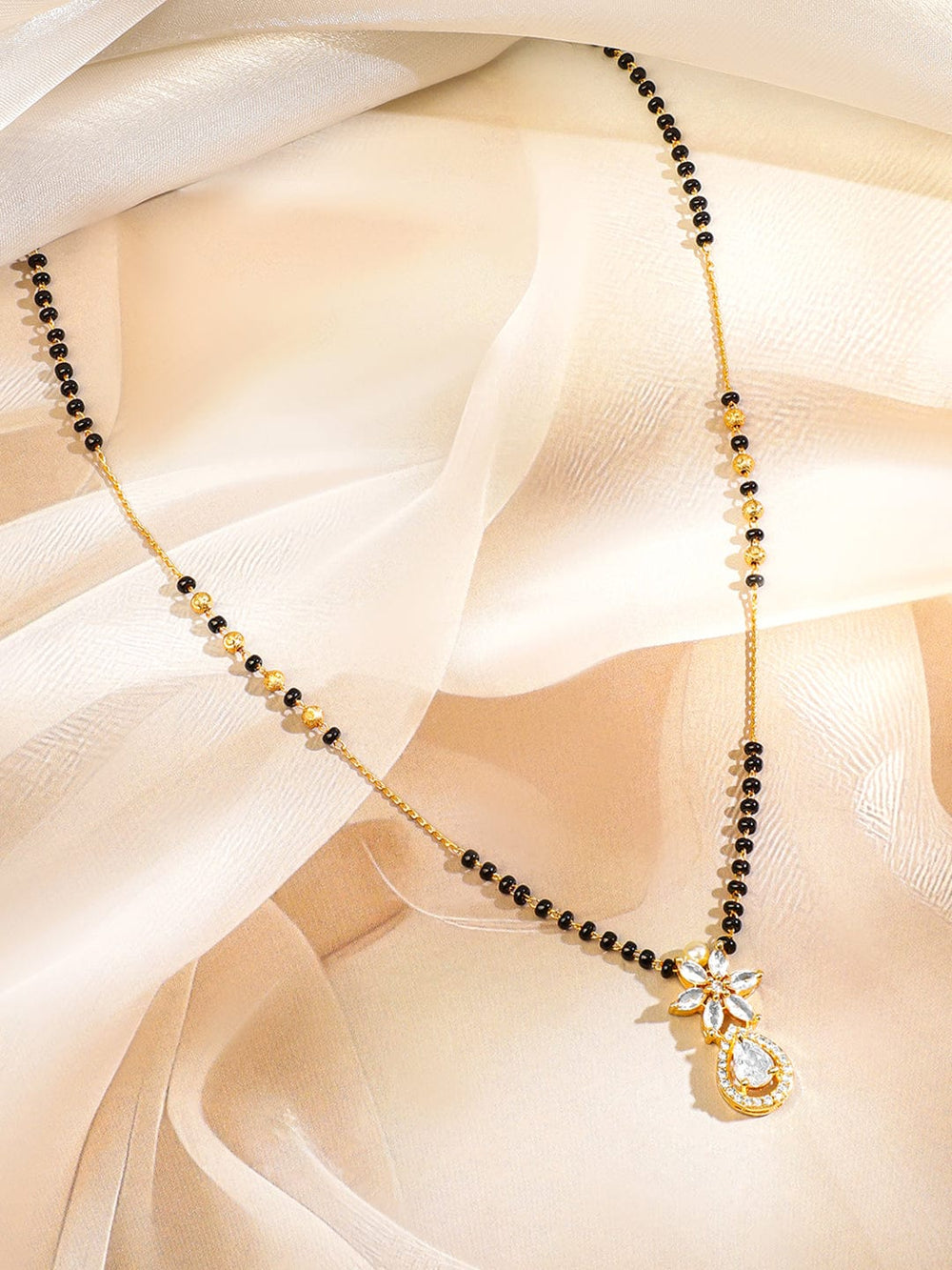Rubans 18K Gold-Plated White Cubic Zirconia Studded Floral & Teardrop Pendant Mangalsutra with Black & Gold Beaded Chain Mangalsutra
