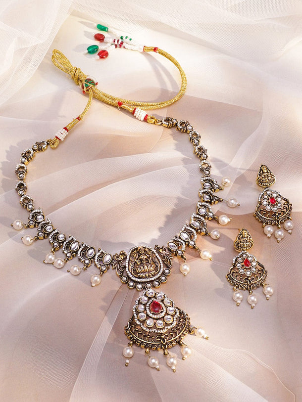 Rubans 22K Antique Gold-Plated Ruby Red Stones, White Pearls & Kundan Detailing Lakshmi Motif Temple Jewellery Set Jewellery Set