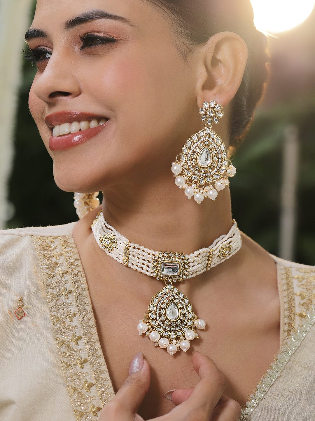 Rubans 22K Gold-Plated Brass White Kundan Pendant Choker Necklace Set with Multi-Strand Pearls, Glossy Pearl Beads Necklace Sets