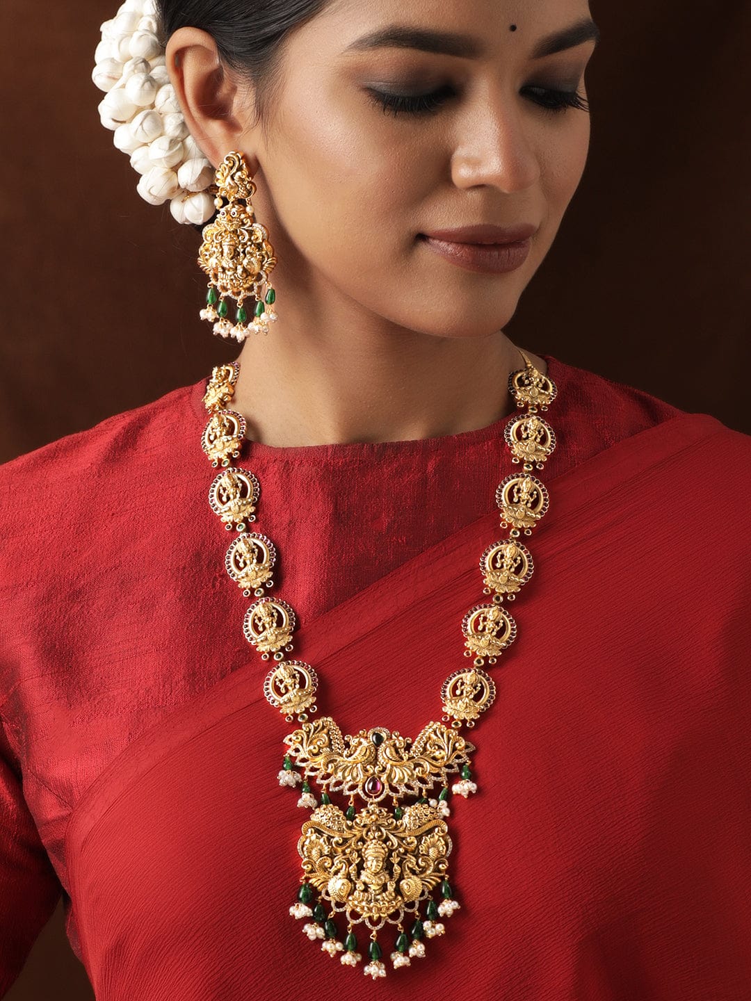 Rubans 22K Gold plated Kemp Red & Green Stone, Handcrafted Pearl beaded Temple Necklace Set Jewellery Sets