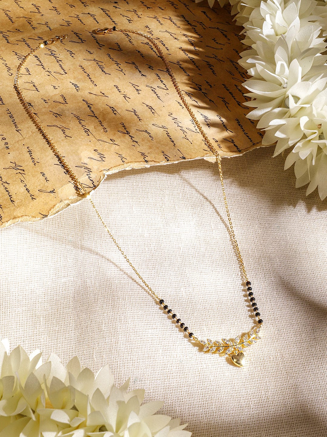 Rubans 22K Gold-Plated Mangalsutra Necklace with Black Beads, Heart-Shaped Pendant & Cubic Zirconia for Women Mangalsutra