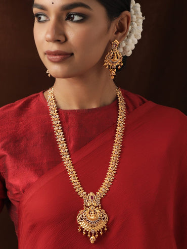 Rubans 22K Gold Plated Red Kemp Stone Studded Handcrafted Floral Temple Long Necklace Set