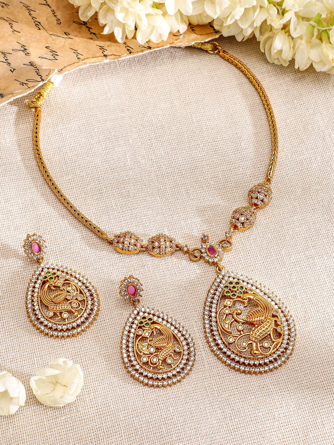 Rubans 22K Gold-Plated Ruby Pink & White Cubic Zirconia Studded Peacock Motif Necklace Set Necklace set