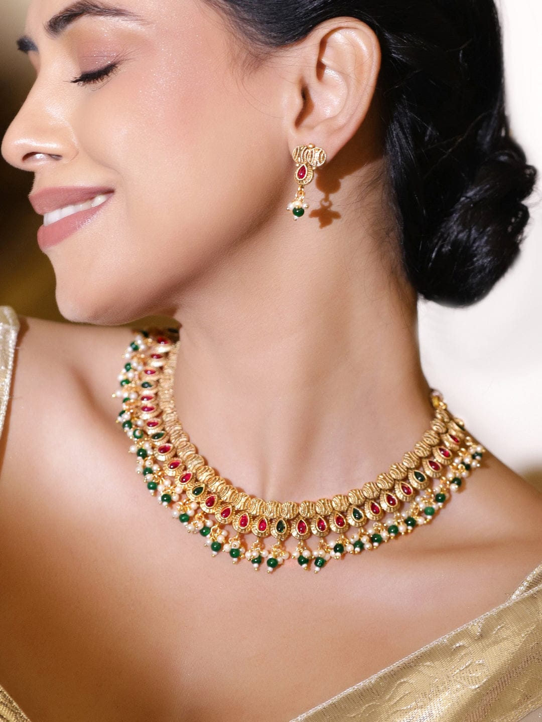 Rubans 22K Gold-Plated Ruby Red & Emerald Green Stone Studded White & Green Pearl Beaded Traditional Handcrafted Necklace Set Jewellery Set