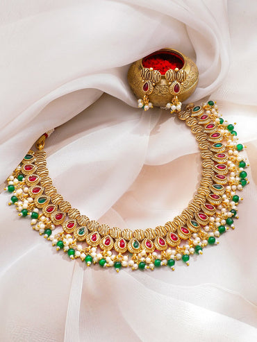Rubans 22K Gold-Plated Ruby Red & Emerald Green Stone Studded White & Green Pearl Beaded Traditional Handcrafted Necklace Set Jewellery Set