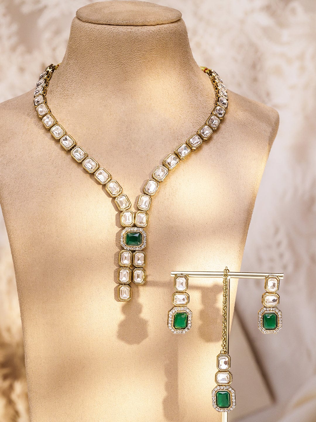 Rubans 22K Gold-Plated White Kundan Studded V-Shaped Necklace Set with Emerald Green Center Stone Jewellery Set