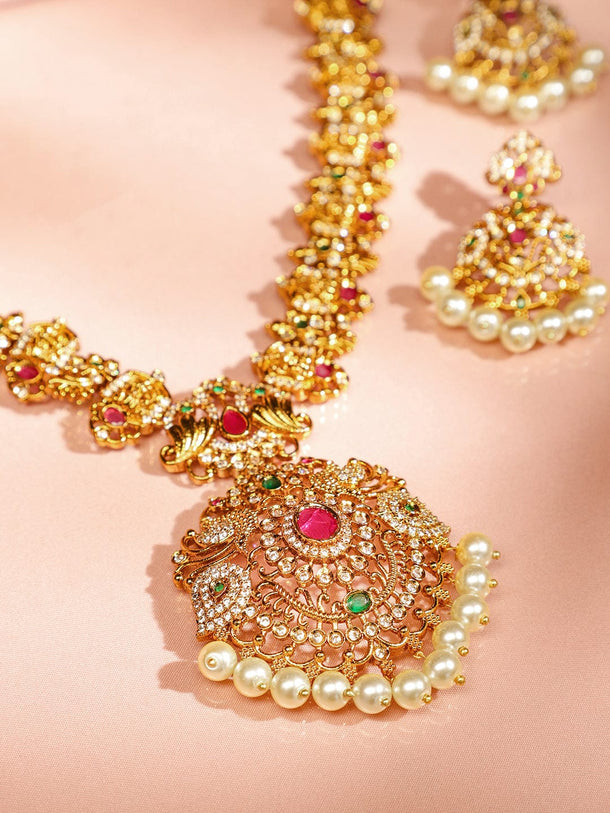 Rubans 24K Gold-Plated Long Lakshmi Motif Temple Jewellery Set with Ruby Pink, Emerald Green, White Cubic Zirconia & Pearl Beads for Women Jewellery Set