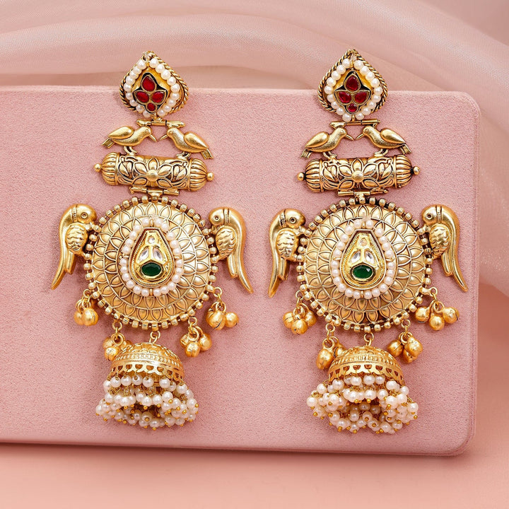 Rubans 24K Gold-Plated Luxurious Jhumka Earrings with Green Stones, Red Accents & Pearls Jhumka Earrings