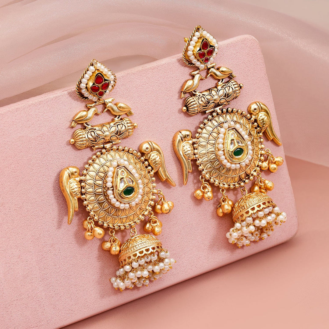 Rubans 24K Gold-Plated Luxurious Jhumka Earrings with Green Stones, Red Accents & Pearls Jhumka Earrings