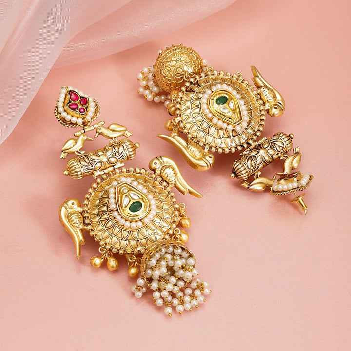 Rubans 24K Gold-Plated Luxurious Jhumka Earrings with Green Stones, Red Accents & Pearls Jhumka Earrings