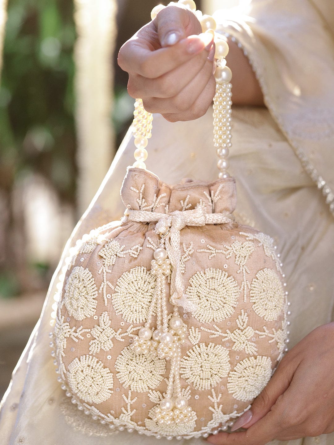Rubans Beige Fabric Potli Bag with Pearl Floral Embroidery, Beaded Handle & Pearl Tassel Bags