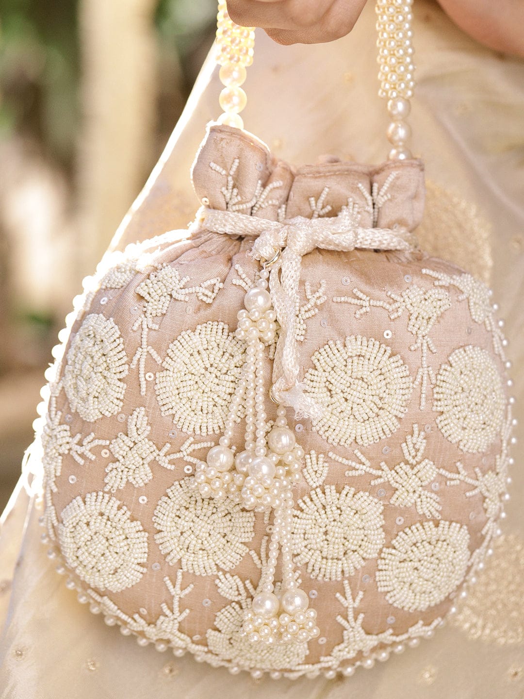 Rubans Beige Fabric Potli Bag with Pearl Floral Embroidery, Beaded Handle & Pearl Tassel Bags