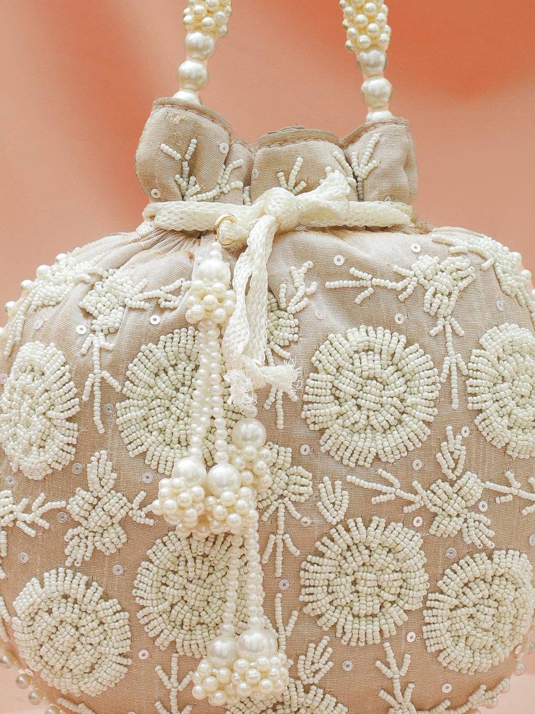 Rubans Beige Fabric Potli Bag with Pearl Floral Embroidery, Beaded Handle & Pearl Tassel Bags
