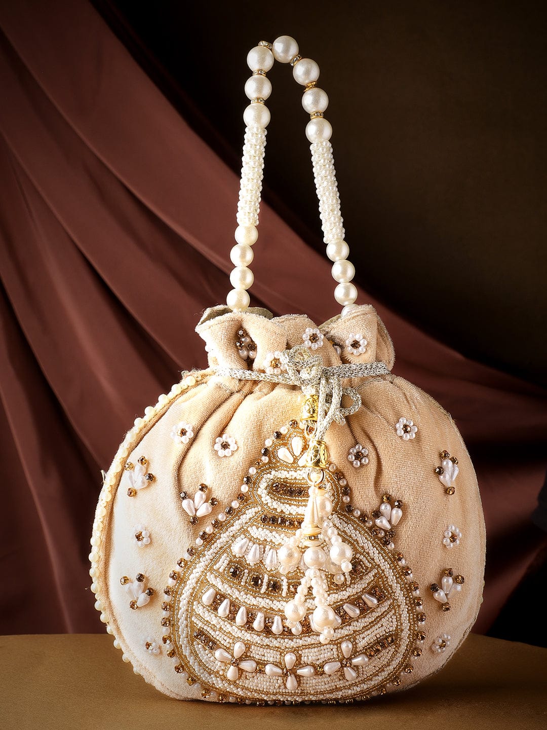 Rubans Beige Potli Bags with Stones, Beads, and Pearl Handle Bags
