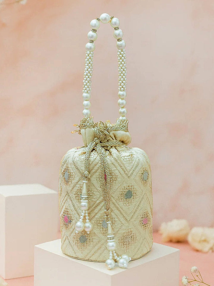 Rubans Cream Potli Bag with Multicolor Pastel Embroidery, Pearl Beaded Handle and Golden Tassel Detailing Bags
