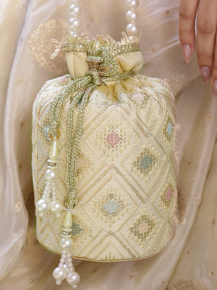 Rubans Cream Potli Bag with Multicolor Pastel Embroidery, Pearl Beaded Handle and Golden Tassel Detailing Bags
