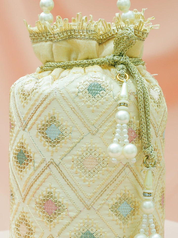 Rubans Cream Potli Bag with Multicolor Pastel Embroidery, Pearl Beaded Handle and Golden Tassel Detailing Bags