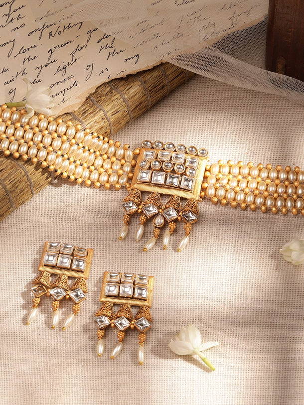 Rubans Gold Pendant Choker Set with White Beads and Stone Accents Jewellery Sets