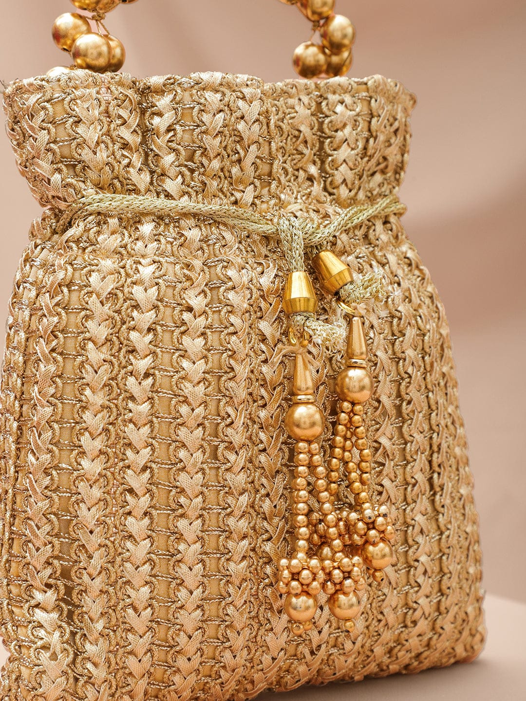 Rubans Gold-Toned Woven Metallic Potli Bag with Golden Bead Handle & Tassel Detailing Bags
