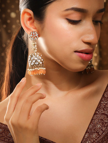 Rubans Handcrafted 22K Gold Plated Kundan Studded Dome Jhumka Earrings with Peach & Pearl Beads Jhumka Earrings